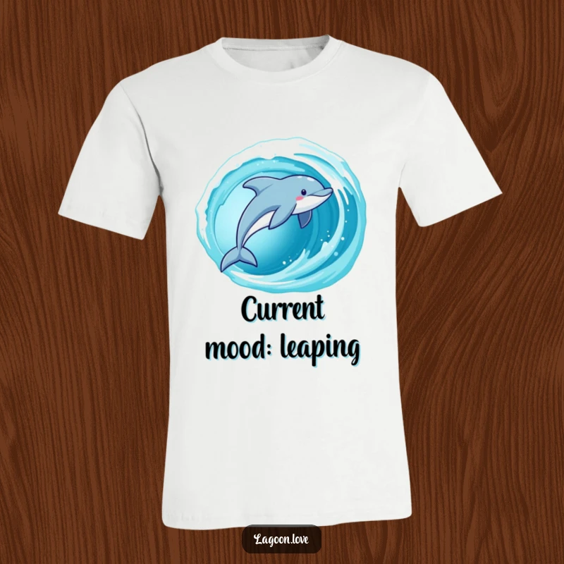 Funny Dolphin T-Shirt featuring an energetic dolphin leaping from a cerulean wave, a fun and playful beach shirt.