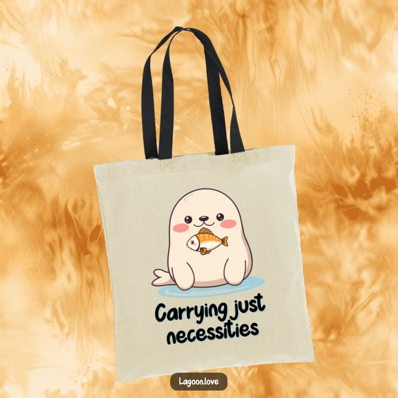 Funny tote bag: a plump, round seal balancing a tiny, colorful fish on its nose.