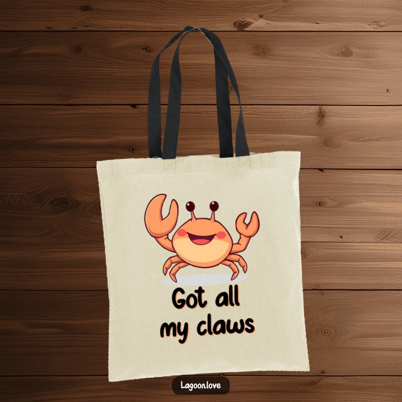 Funny tote bag: a cheerful, stubby crab with a wide, open-mouthed grin waving a large claw.